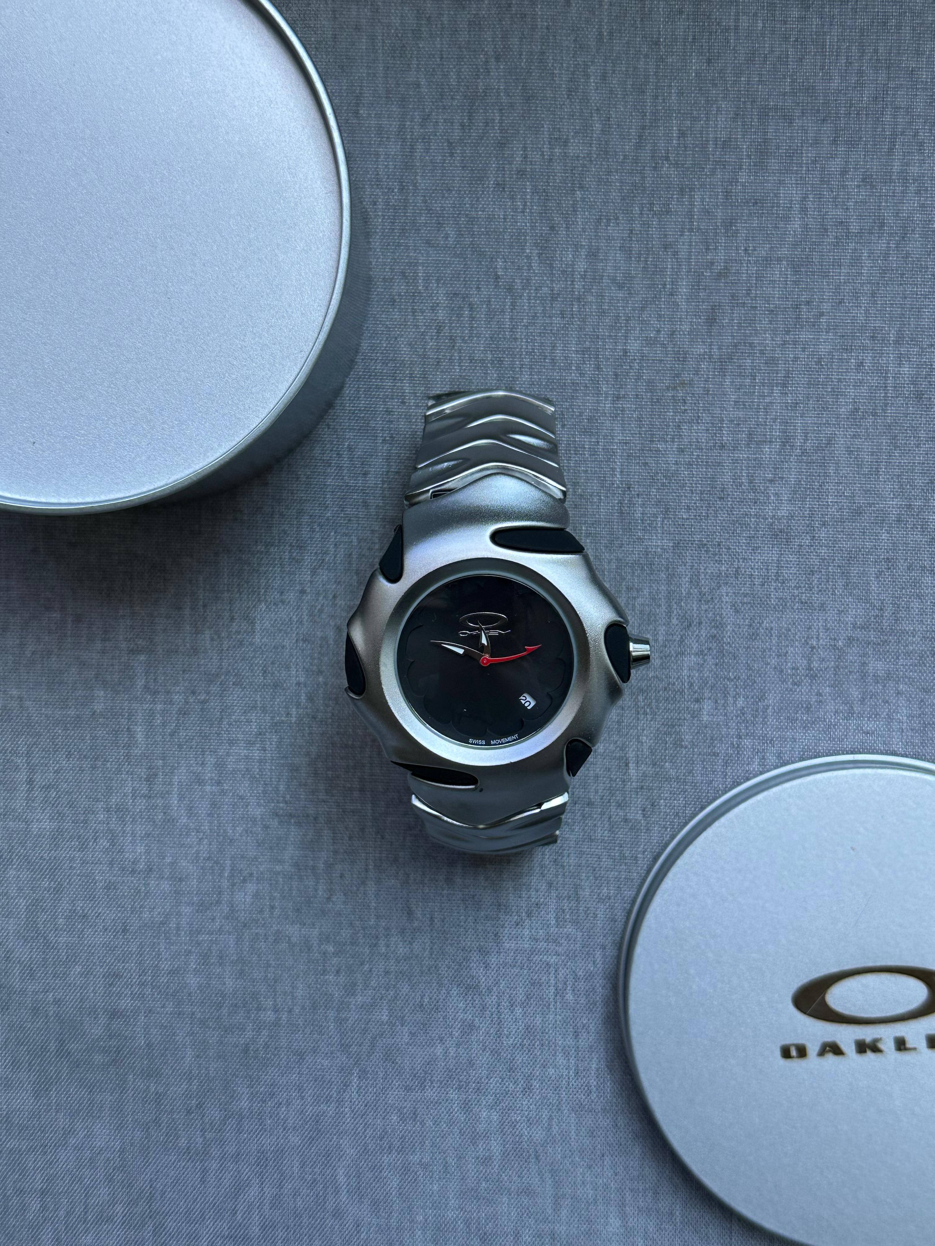 Oakley Blade Watch: Silver brushed Stainless Steel with Black Dial