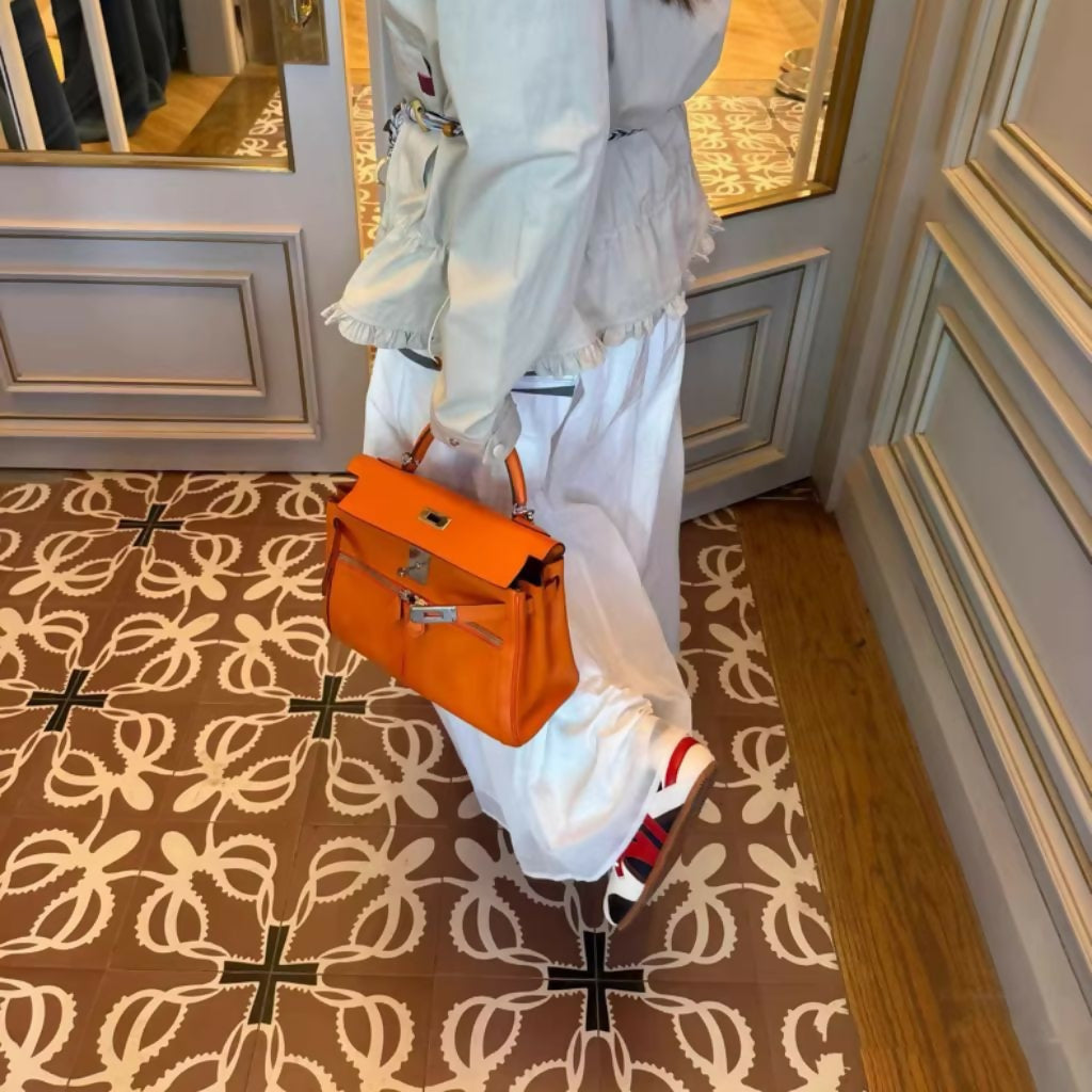 Hermès Kelly 28 Lakis orange swift leather palladium hardware