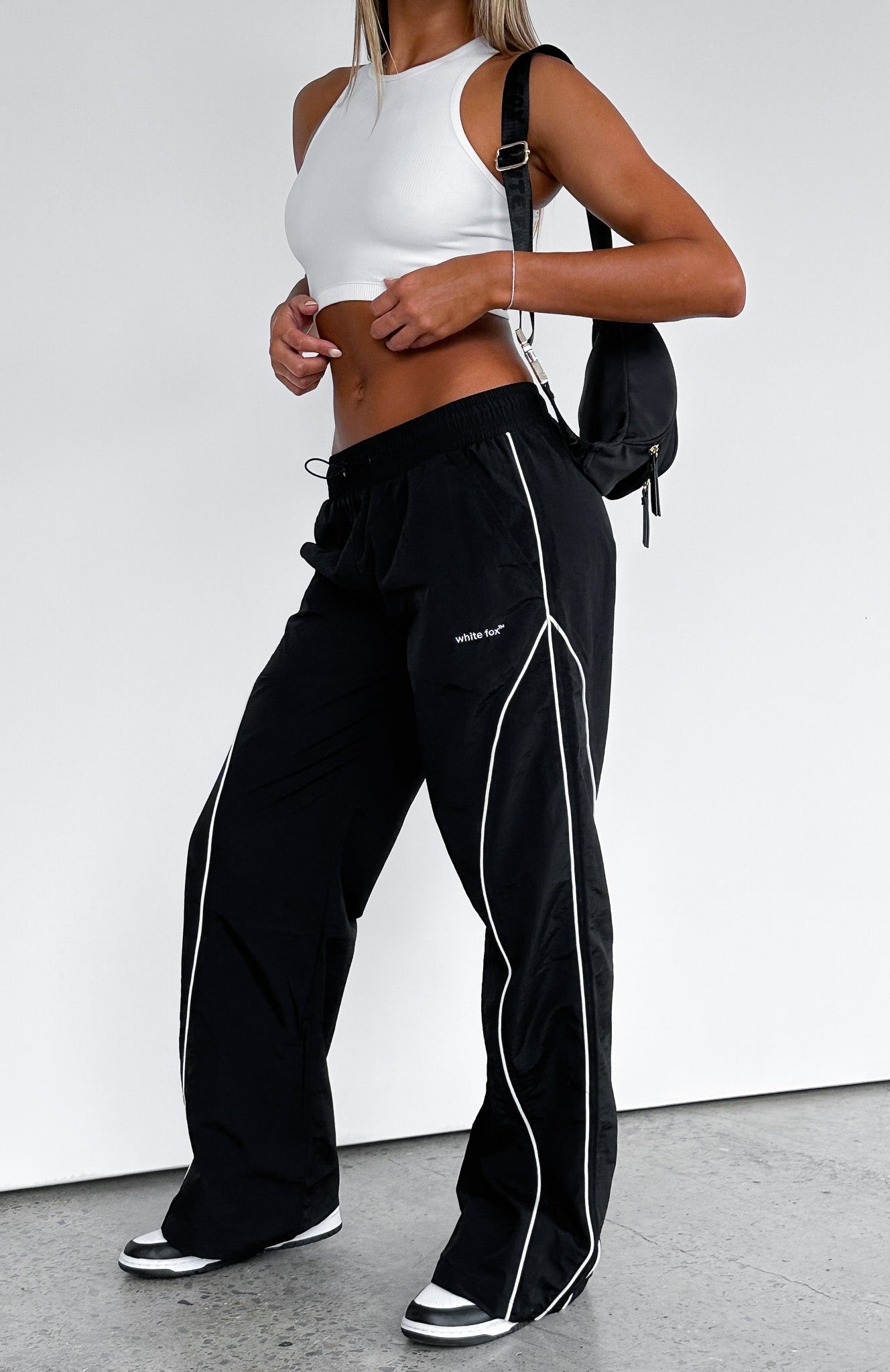 Unphased Track Pants Black | White Fox Boutique US