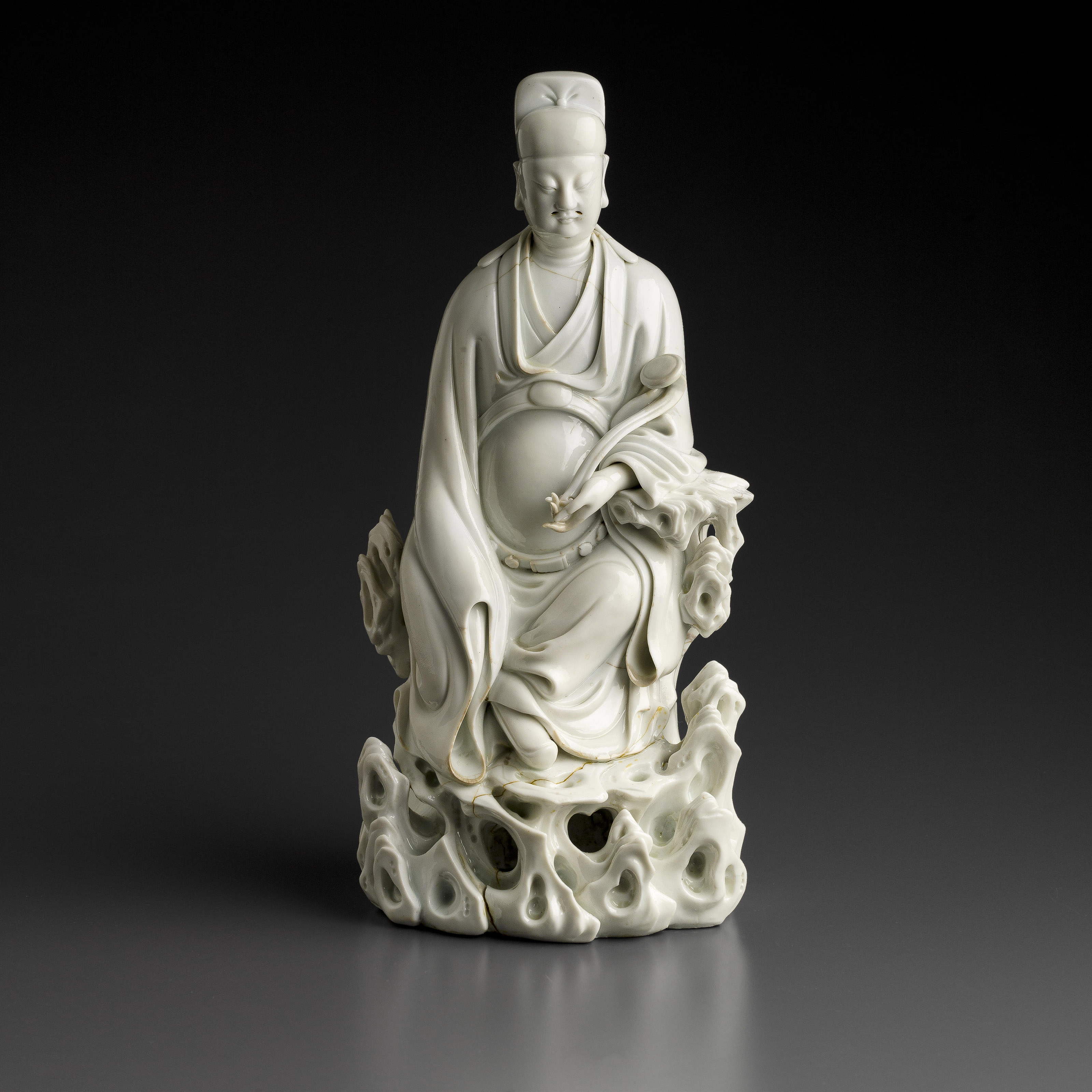 TWO DEHUA RHINOCEROS HORN-FORM LIBATION CUPS, 17TH/18TH CENTURY