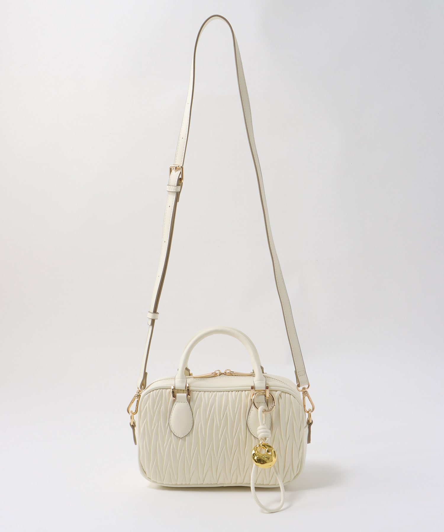 チャーム付きキルト柄ミニボストンバッグ | AND ON JIONE STORE