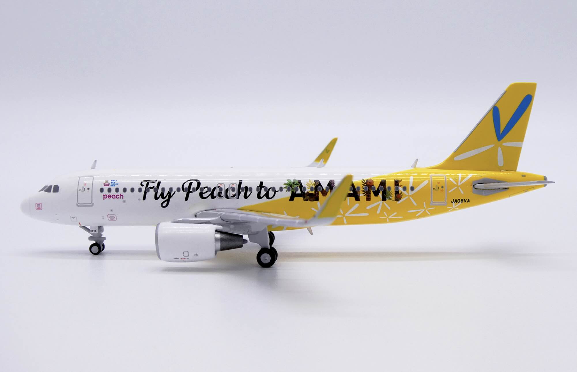 EW4320014 Peach Aviation A320 “Fly Peach to AMAMI” JA08VA