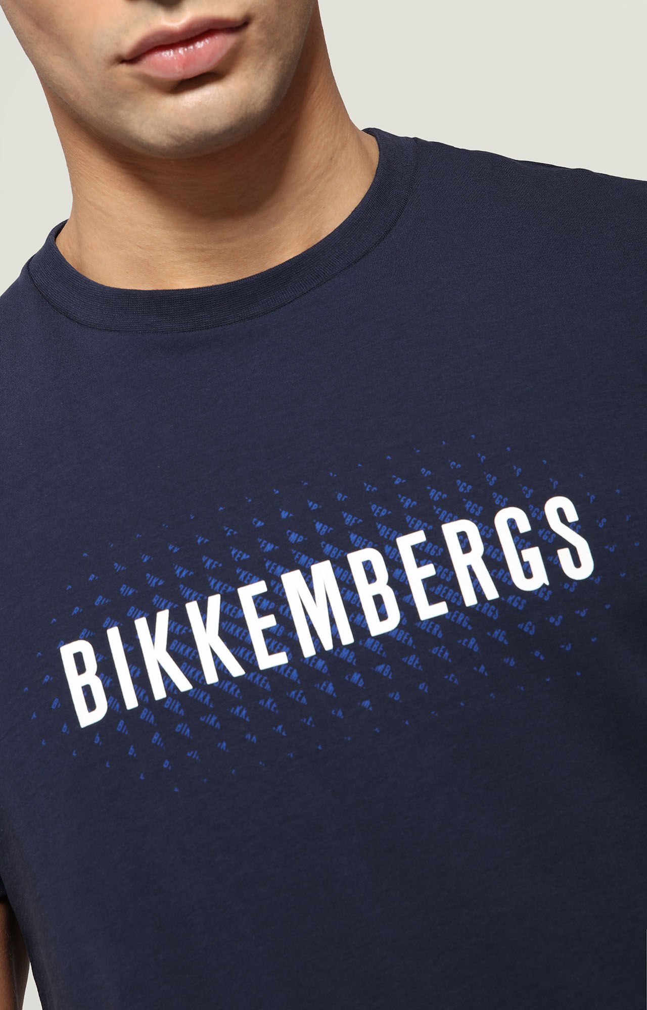 Men's Blue T-shirt with textured logo print | Bikkembergs