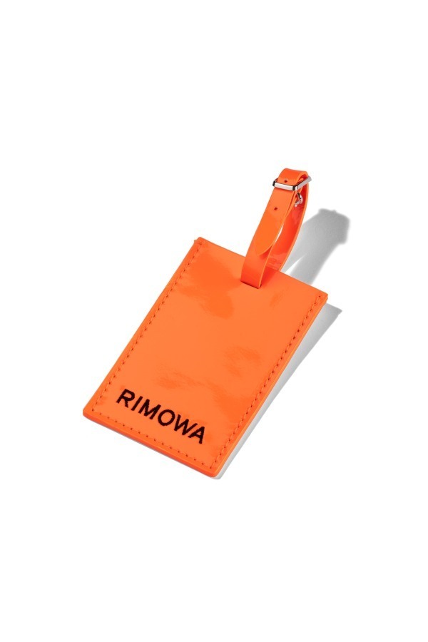 リモワ×アンブッシュ、オレンジレザーのラゲージハンドル＆タグ発売