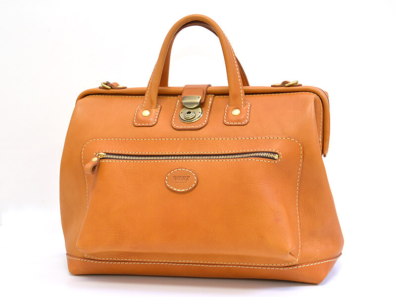 旅行に便利な大ポケット付きのソフトレザー口枠ボストンバッグ / 革鞄