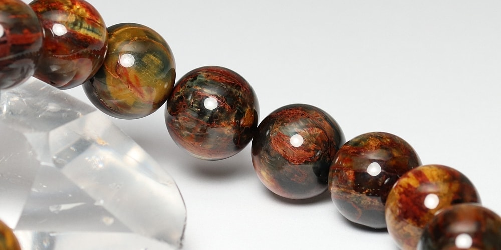 高品質]ピーターサイトブレスレット（約13mm玉・ゴールデン＆レッド