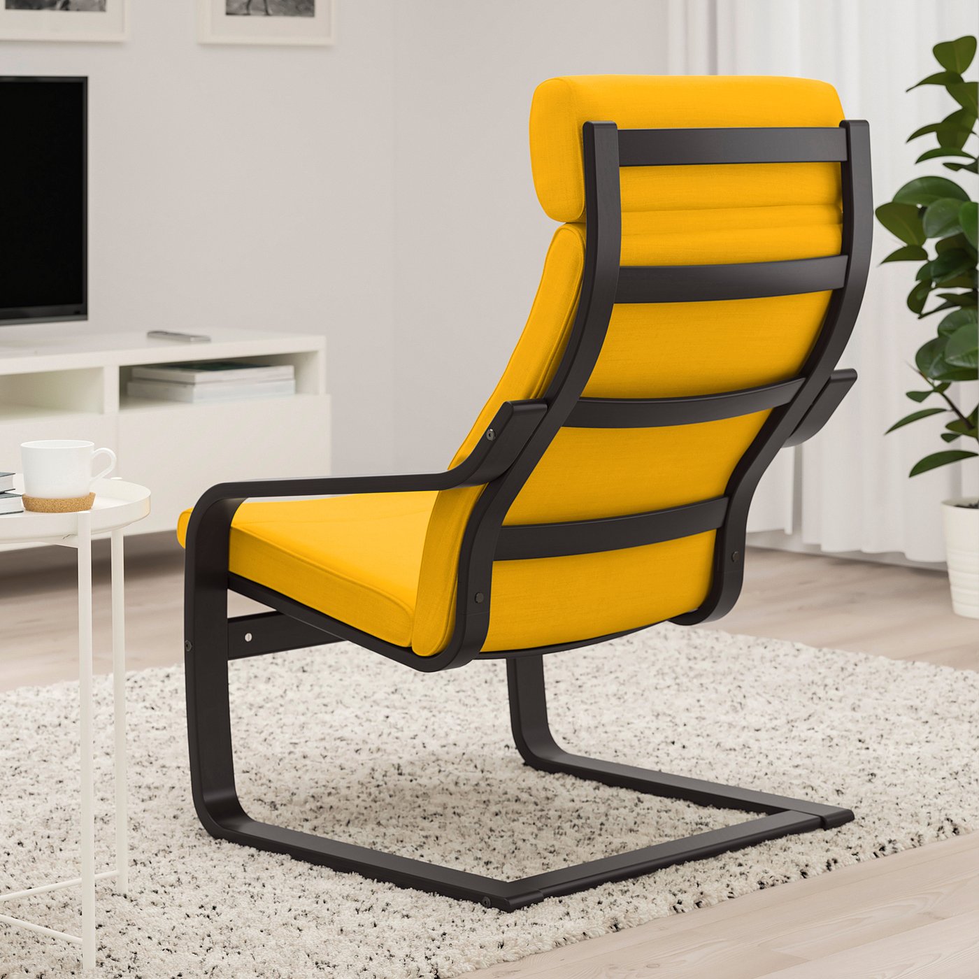POÄNG armchair, black-brown/Skiftebo yellow - IKEA