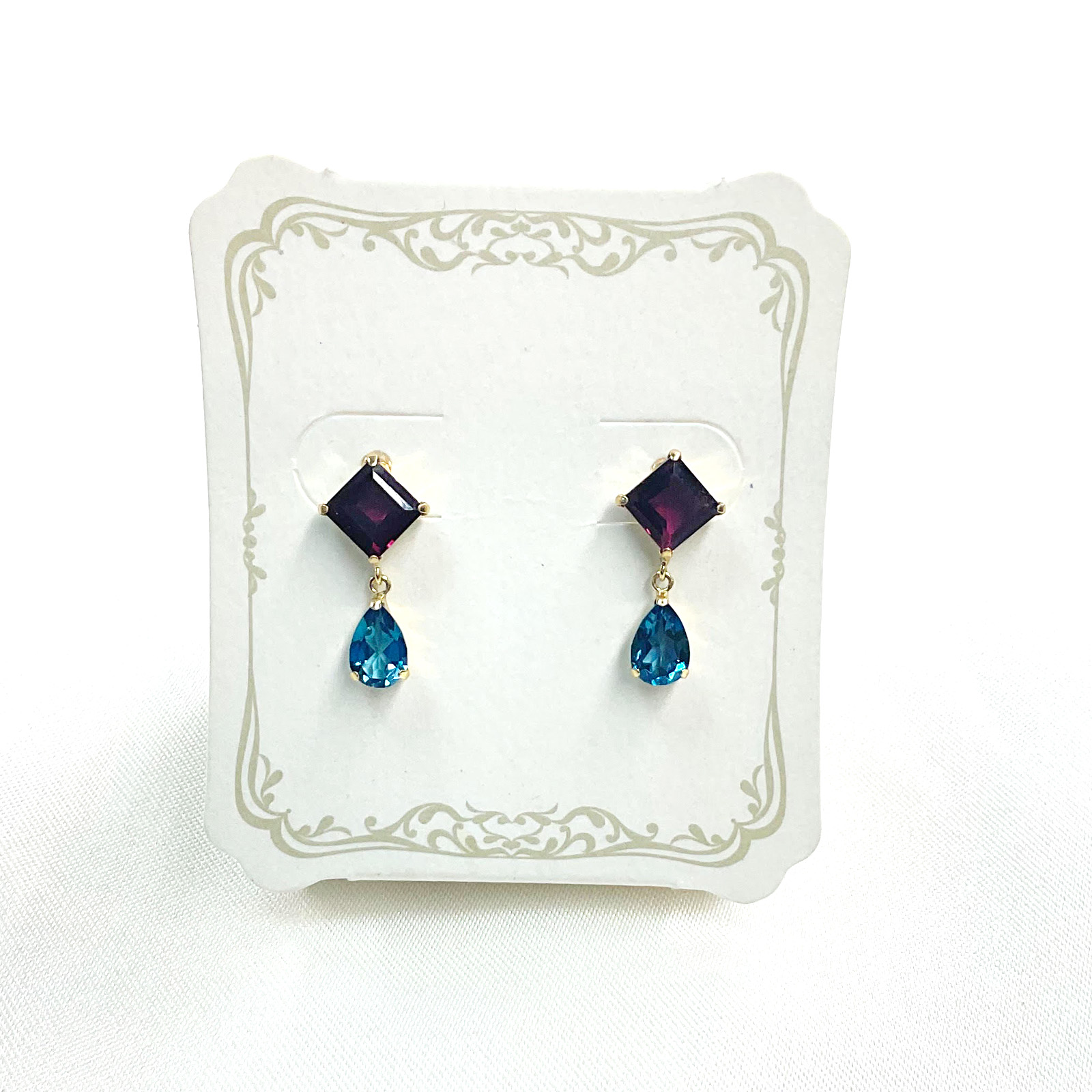 ジュエリーまつき / K18ガーネット/ロンドンブルートパーズピアス