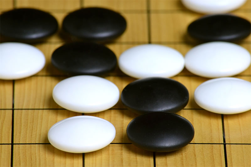 硬質ガラス新生碁石 梅印（8mm） | 前川榧碁盤店