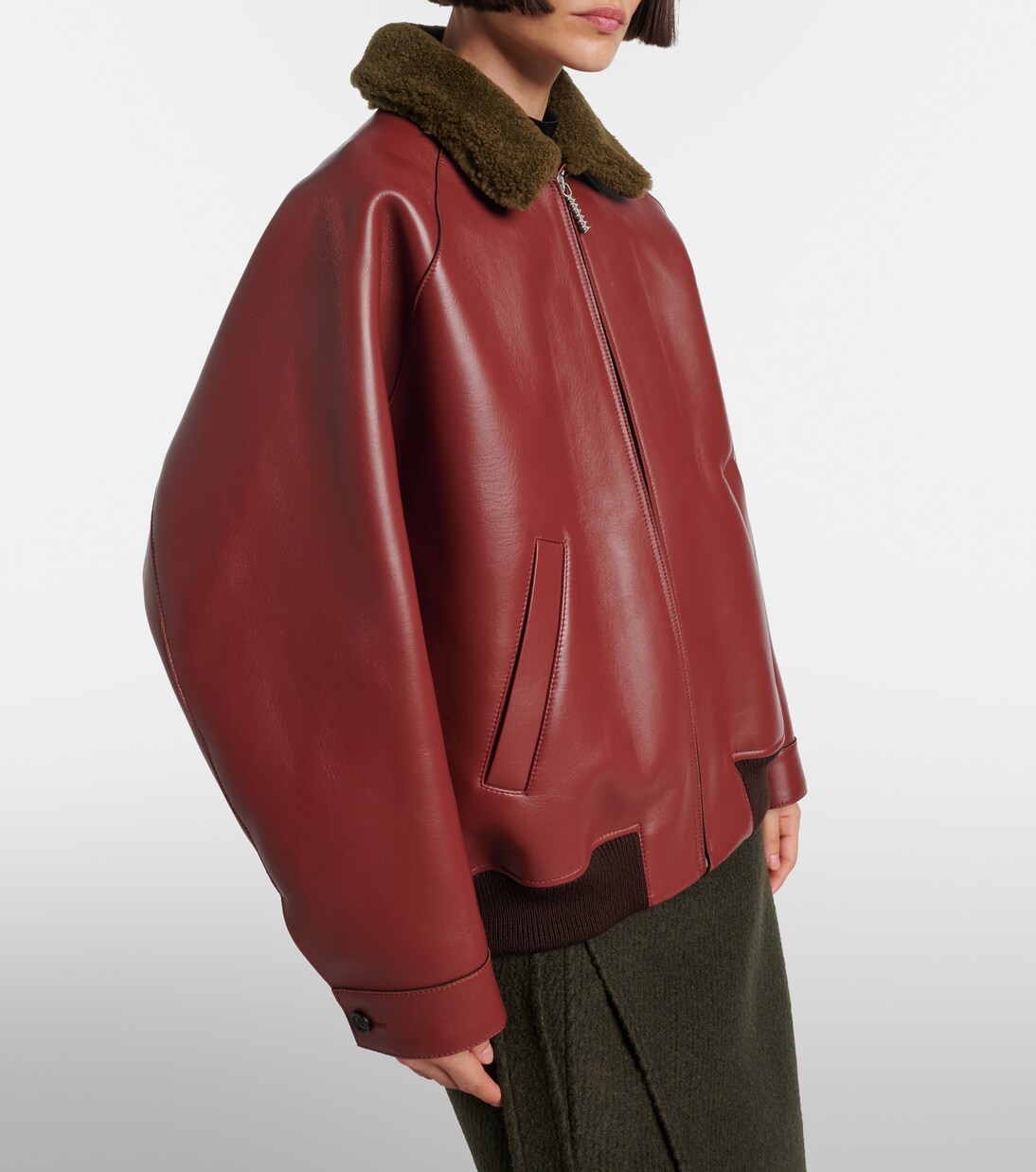 Shearling-trimmed leather blouson jacket in burgundy - Marni