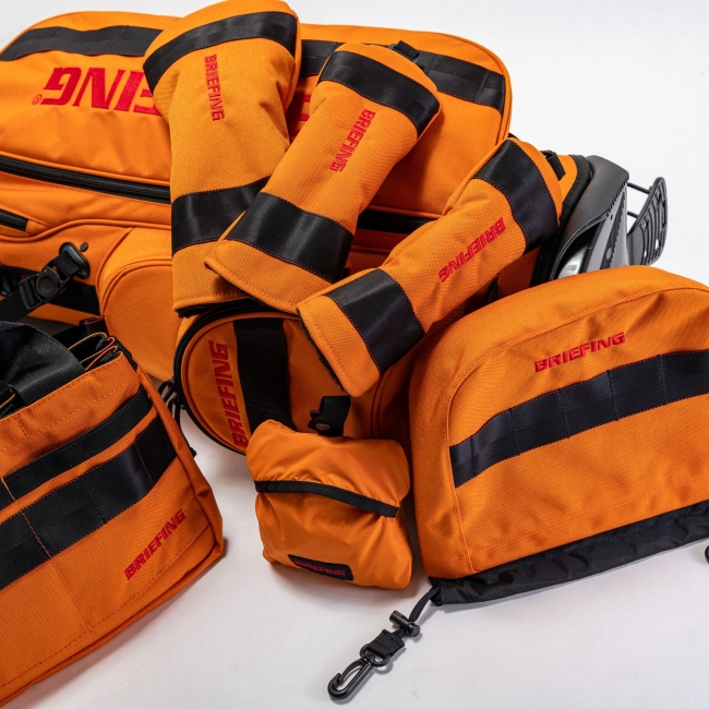 キャディバッグやグッズも！オレンジ色のブリーフィング限定アイテムが