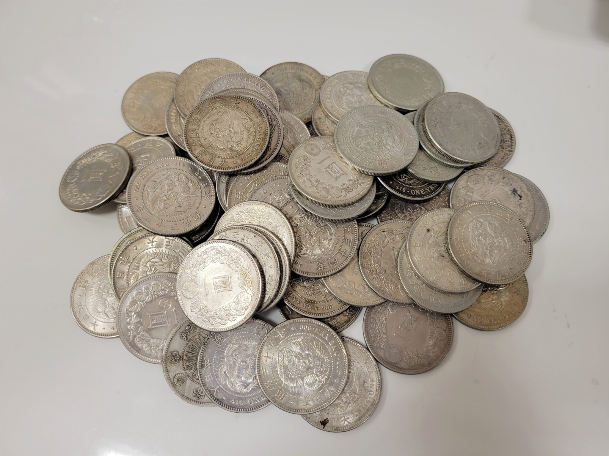 一圓銀貨、貿易銀 古銭まとめてお買取りしました。修正品について教え