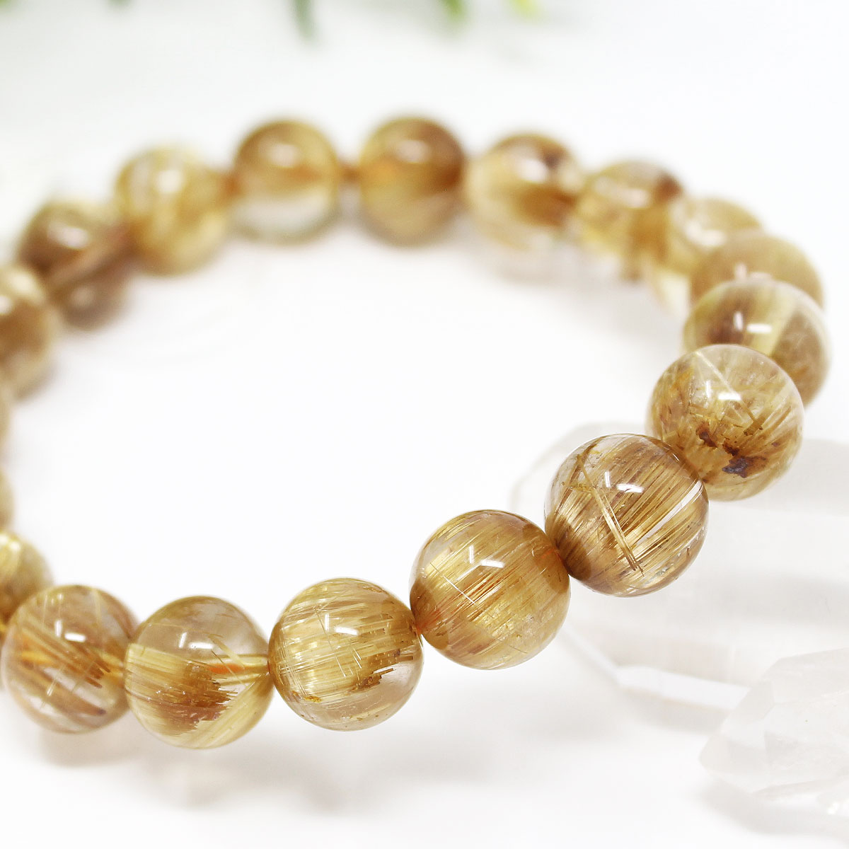 極上 10-10.5ミリ タイタン ルチルクォーツ （金線入水晶