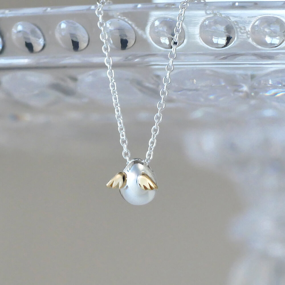 シルバー 卵型ペンダント ネックレス Uzu Emperor