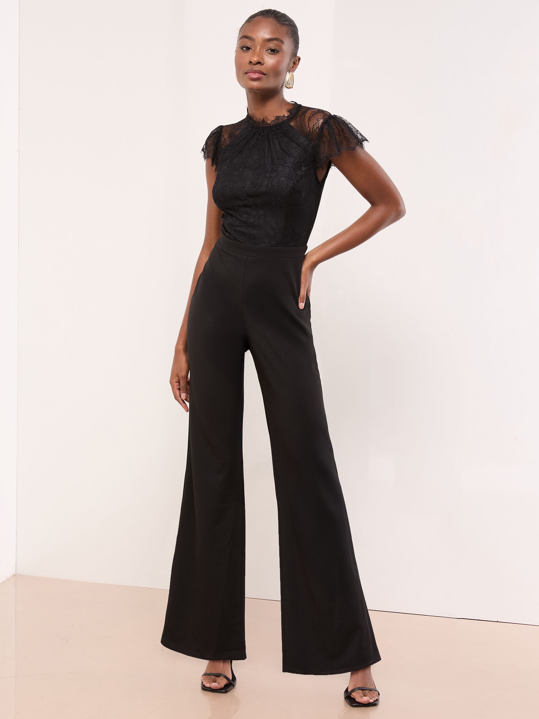 Buy Lipsy Black Lace High Neck Short Sleeve Jumpsuit from the Next