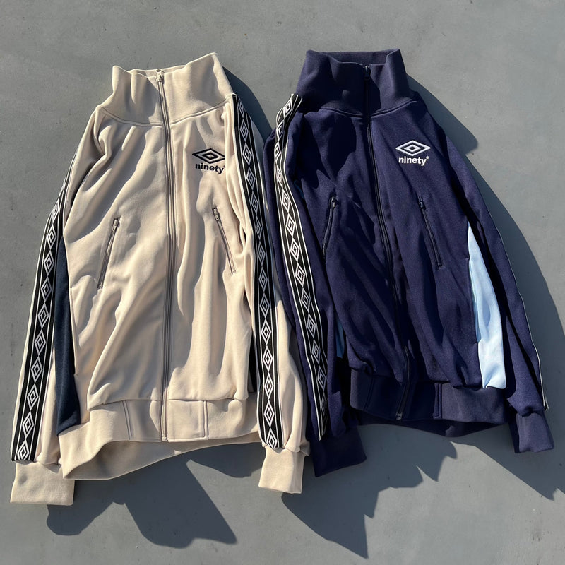 9090 × UMBRO DIAMOND LOGO TRACK JACKET – YZ