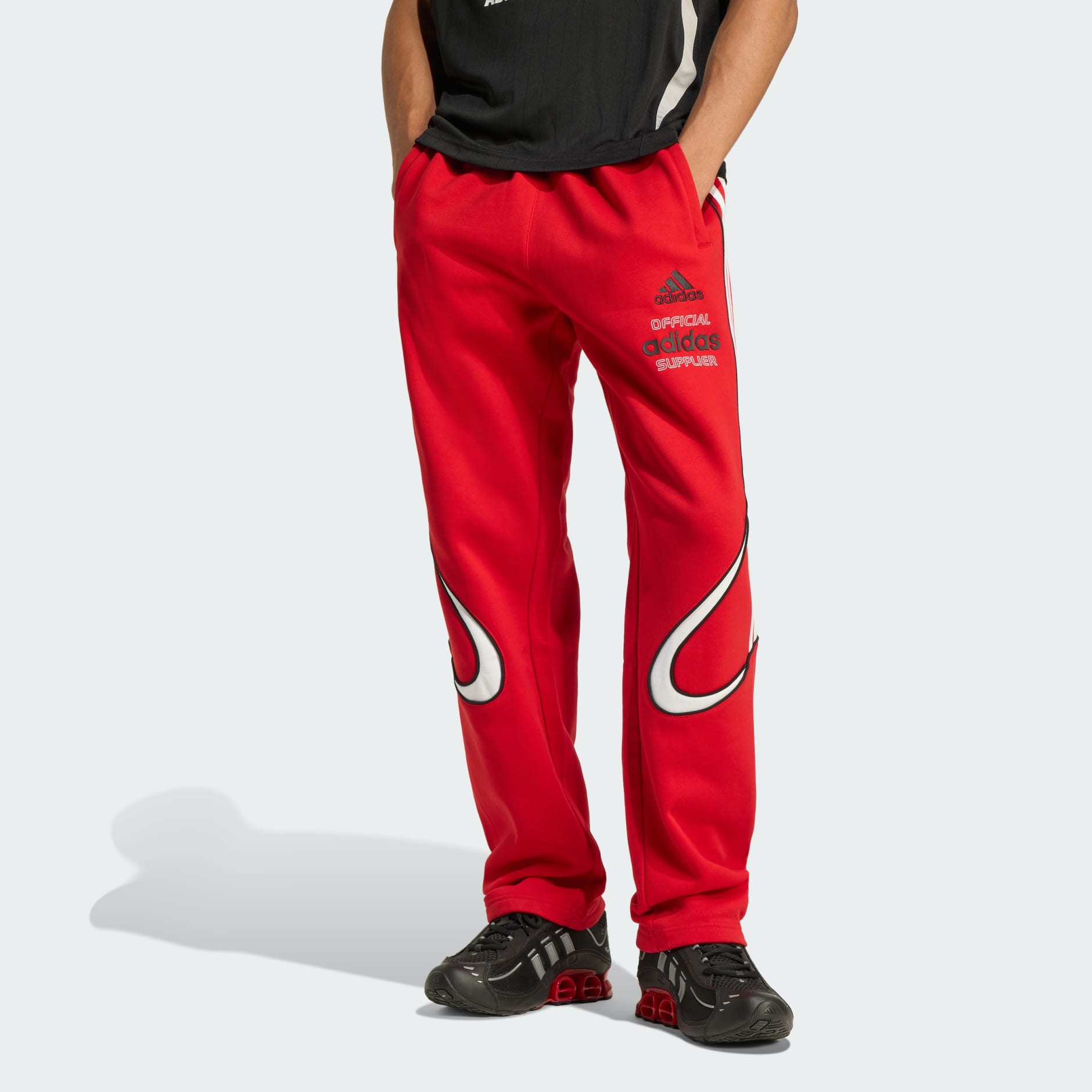 Clothing - TEAMGEIST GRAPHIC FLEECE PANT - Red | adidas Oman