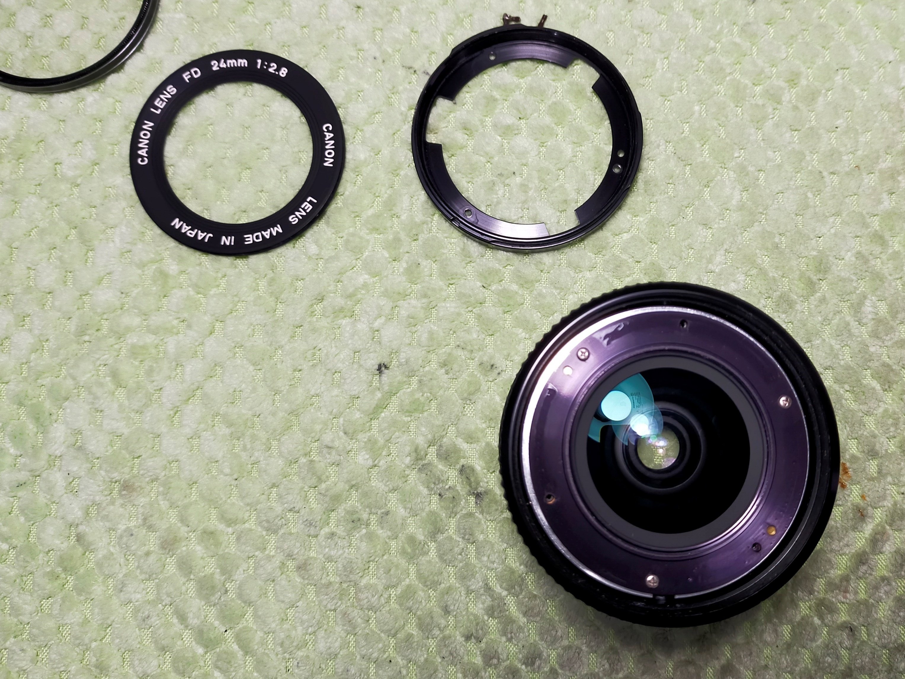 Canon New FD 24mm F/2.8の分解｜フィルムカメラ修理のアクアカメラ