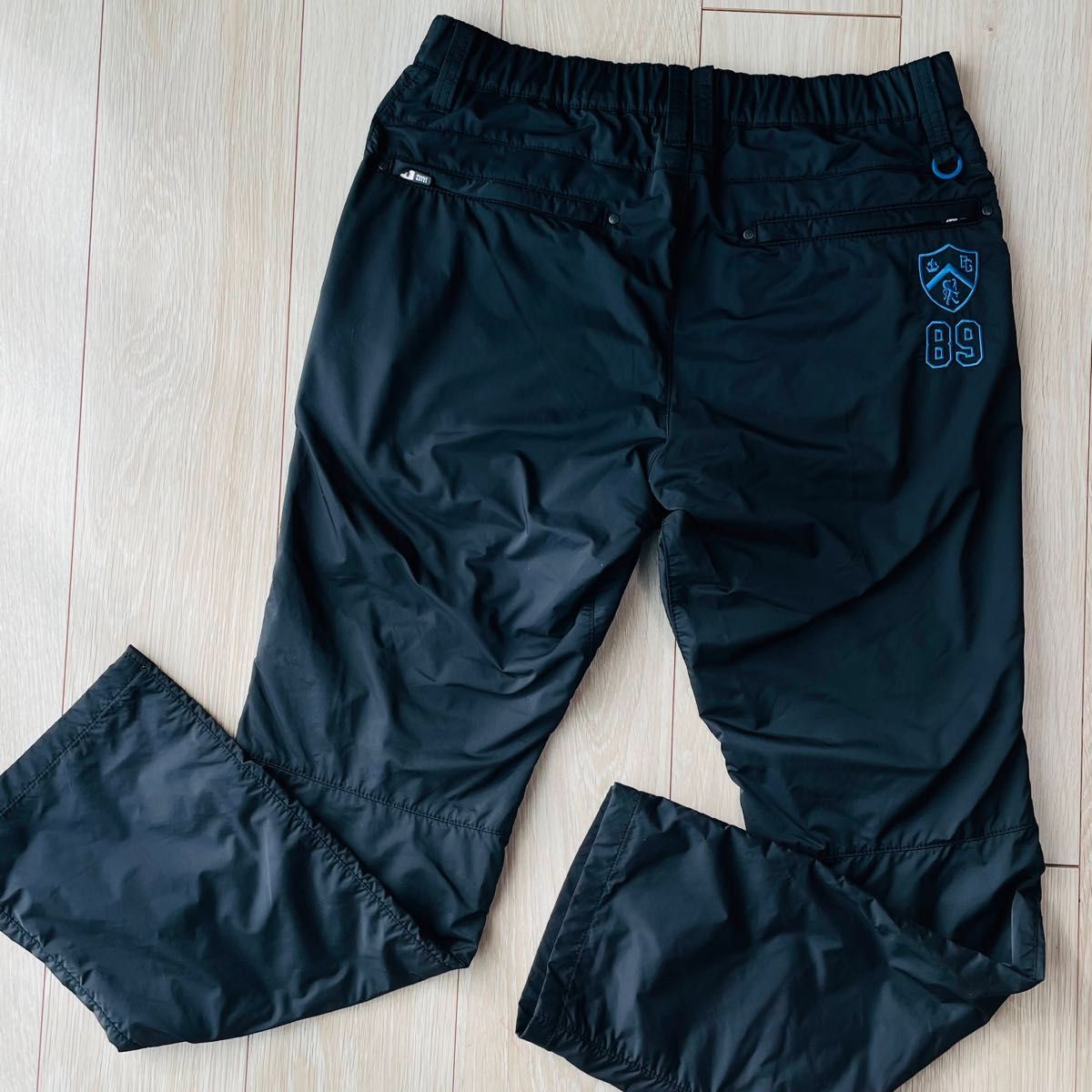 美品 パーリーゲイツ パンツ 6 メンズ ブラック 防寒 防風 PEARLY