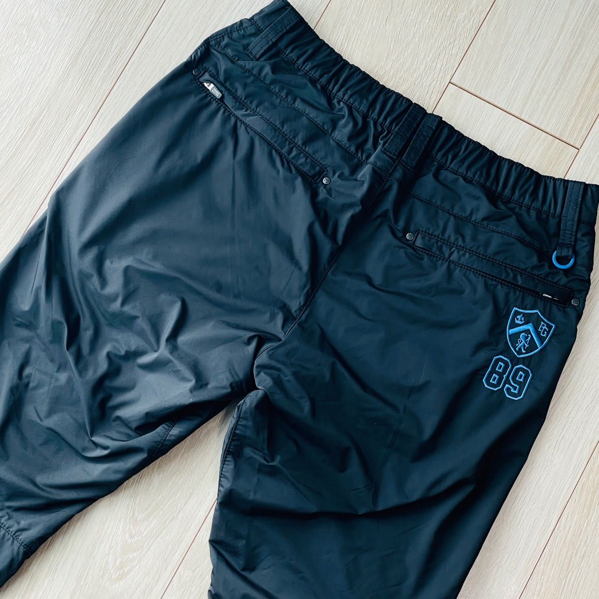 美品 パーリーゲイツ パンツ 6 メンズ ブラック 防寒 防風 PEARLY