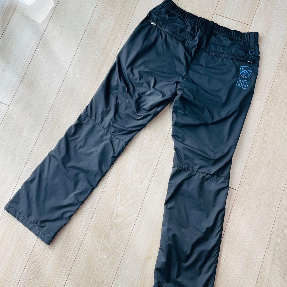 美品 パーリーゲイツ パンツ 6 メンズ ブラック 防寒 防風 PEARLY