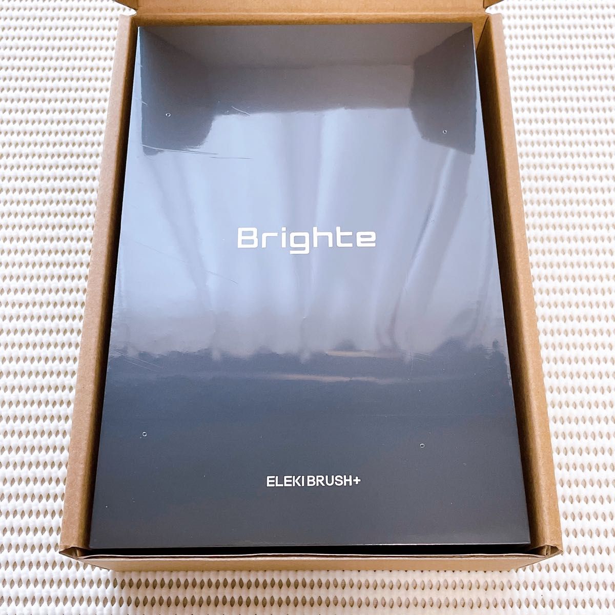 未開封品のブライトエレキブラシプラスと開封済みのエレキコーム