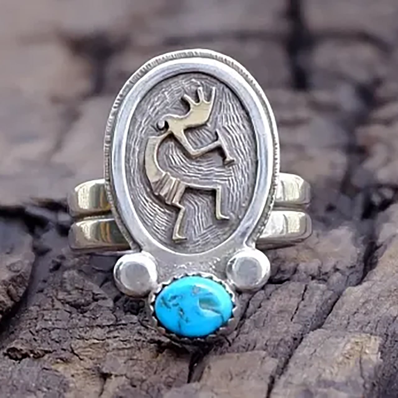 ナバホ族・ R.B【ランニング・ベアー】ココペリターコイズリング