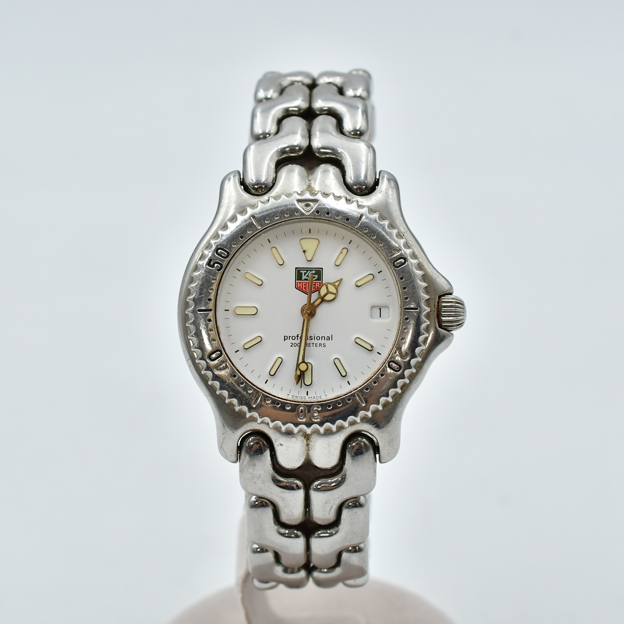 タグホイヤー プロフェッショナル 白文字盤 SS/QZ S90.806K 買取実績