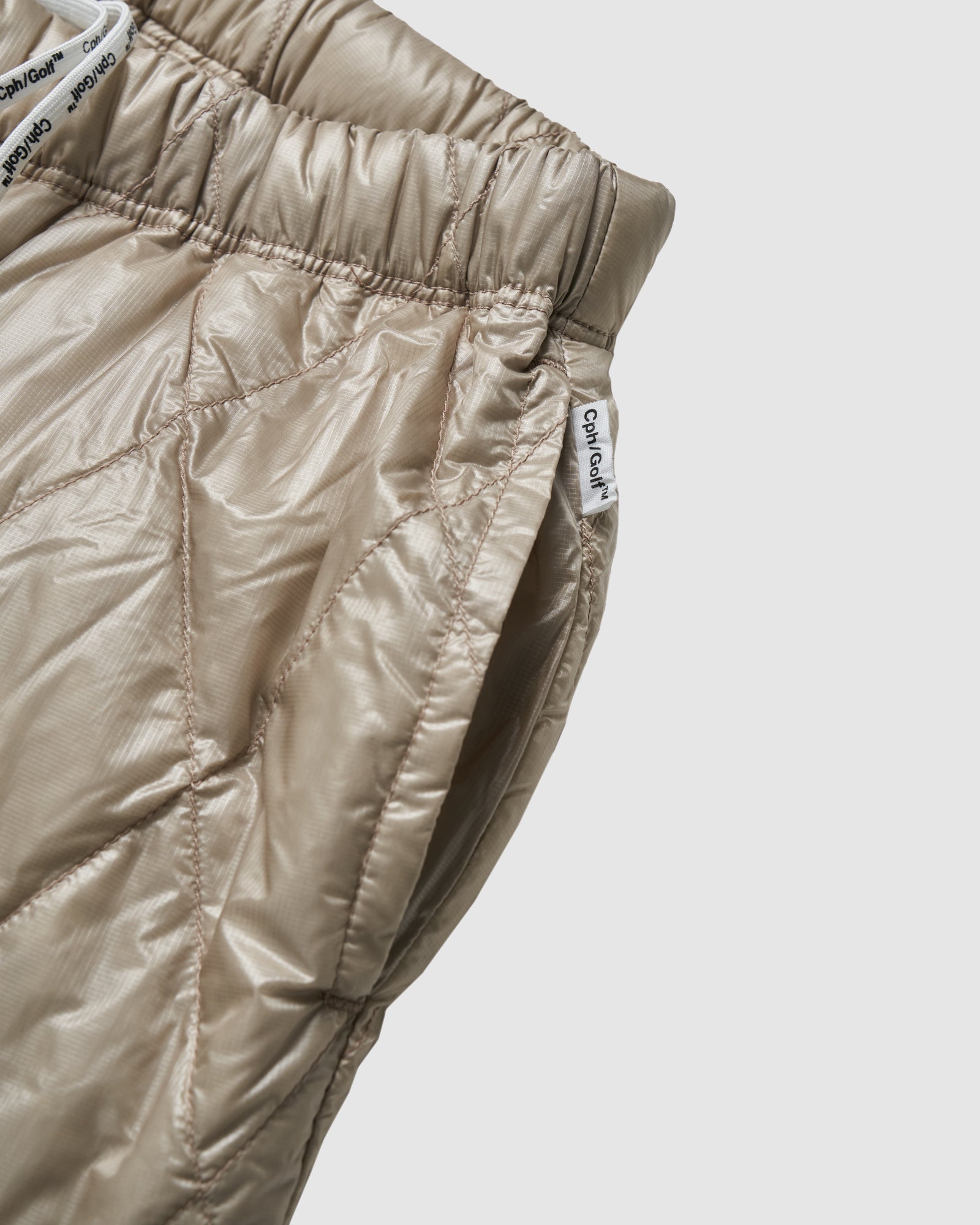 NANGA® × Cph/Golf™ #QLT DOWN TRACK PANTS - BEIGE - – Cph/Golf™︎