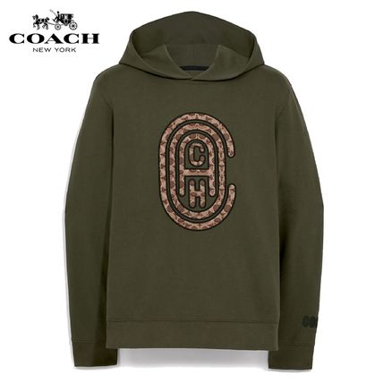 グリーン（緑）系 Coach(コーチ) パーカー・フーディ(メンズ