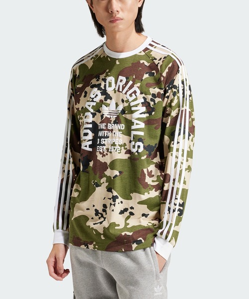adidas（アディダス）の「カモ柄 長袖 カリTシャツ / ロンT