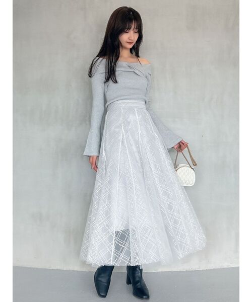 dazzlin（ダズリン）の「スパンコールチュールチェックスカート