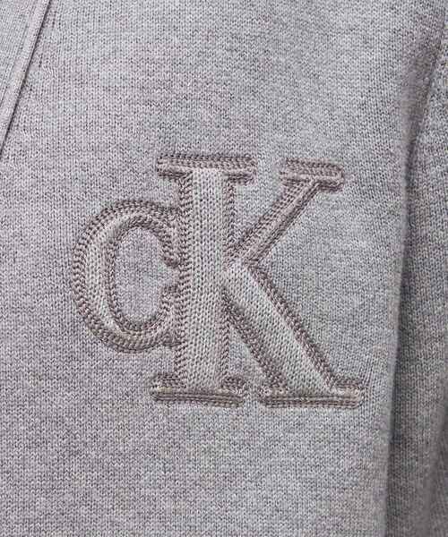 Calvin Klein（カルバン・クライン）の「バーシティ カーディガン