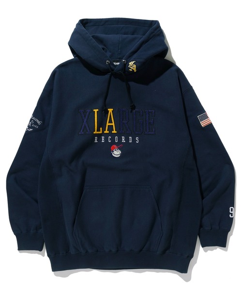 XLARGE（エクストララージ）の「XL LABEL SOUVENIR HOODED SWEAT