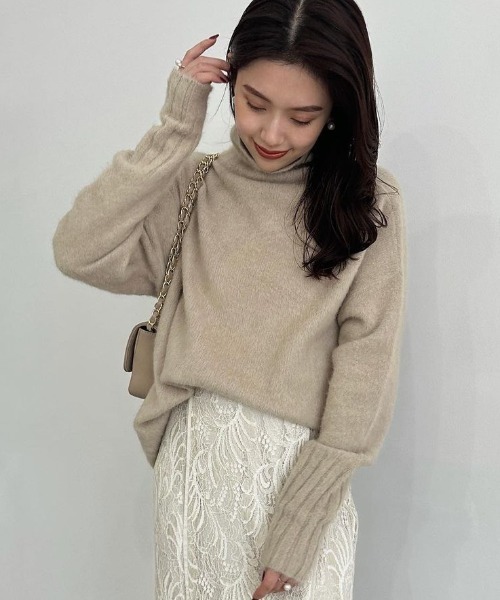 anuans（アニュアンス）の「ラクーンフォックスタートルネックニット