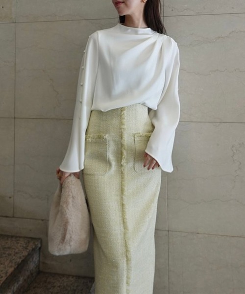 anuans（アニュアンス）の「フロントポケットツイードスカート