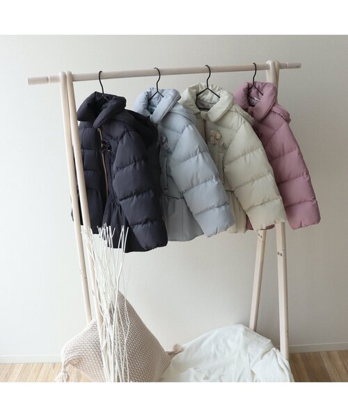 apres les cours（アプレレクール）の「ペプラムリボン中綿アウター