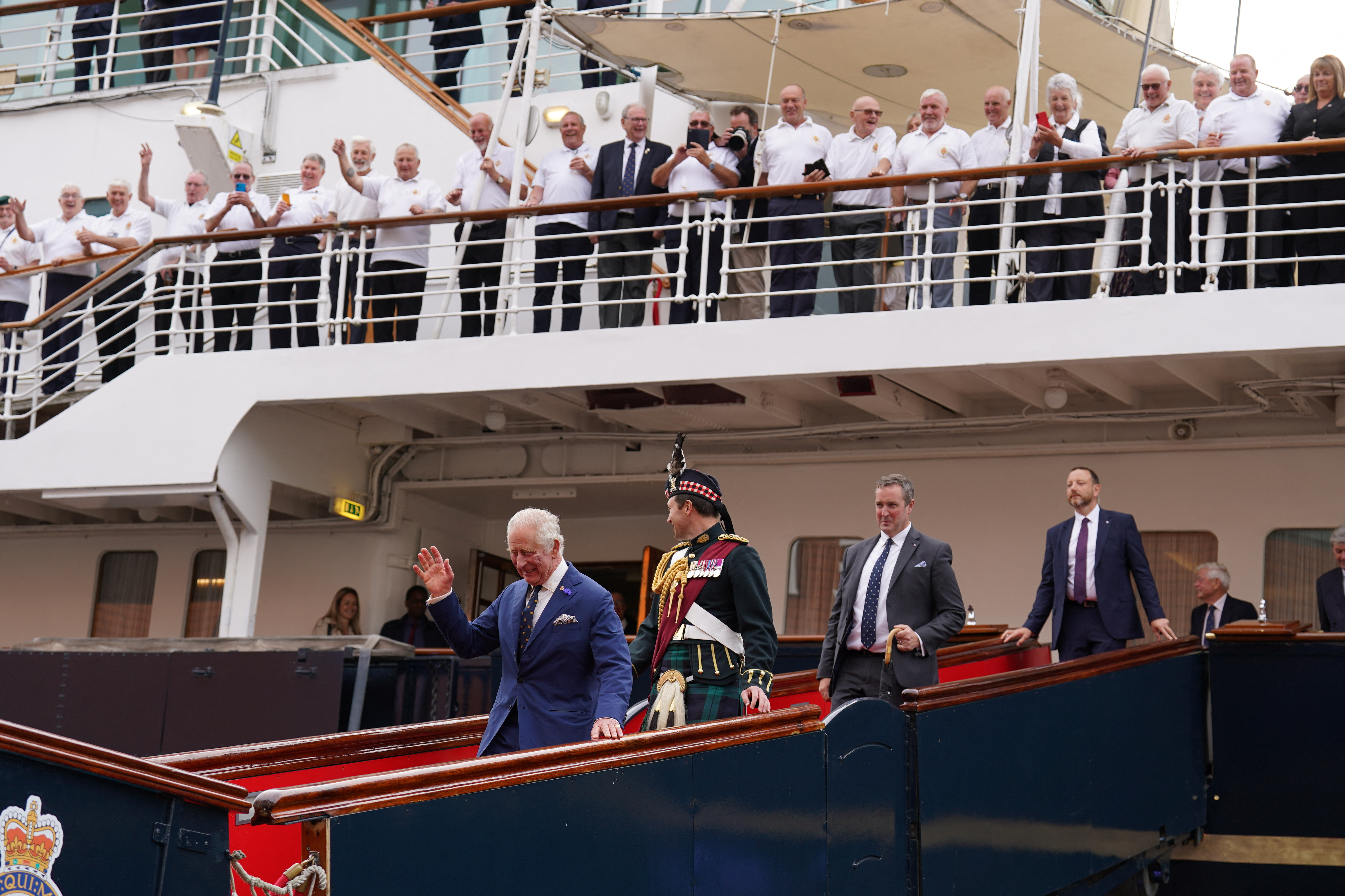 Charles III returns to the Royal Yacht Britannia, on which he took