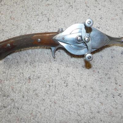 LOT 24 ANTIQUE? HURD SUPER CASTER AND METAL ROD | EstateSales.org