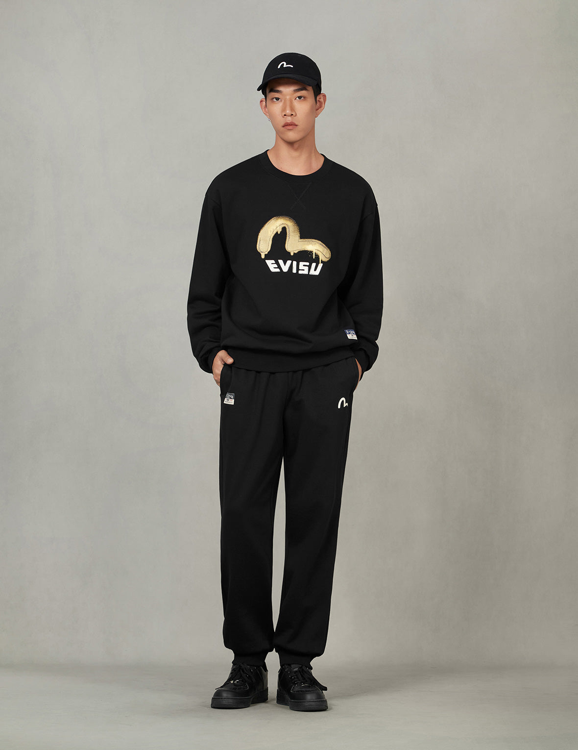 だるまと知恵の輪大黒プリント ストレートフィット スウェットパンツ