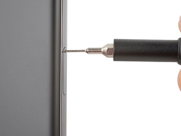 Google Pixel 8a SIMカードトレイの交換 - iFixit 修理ガイド