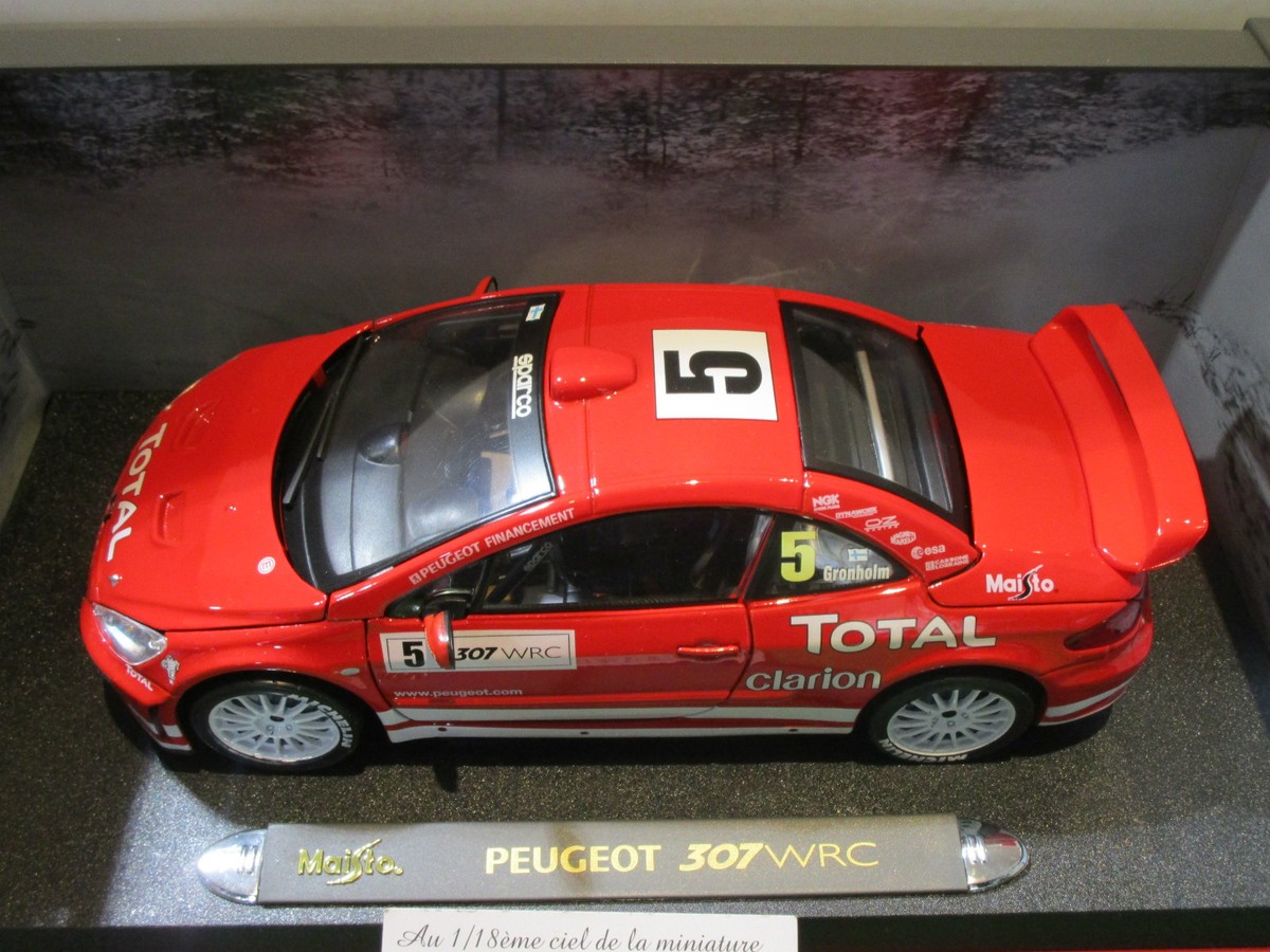 PEUGEOT 307 WRC RALLYE # 5 GRONHOLM rouge au 1/18 MAISTO 38693