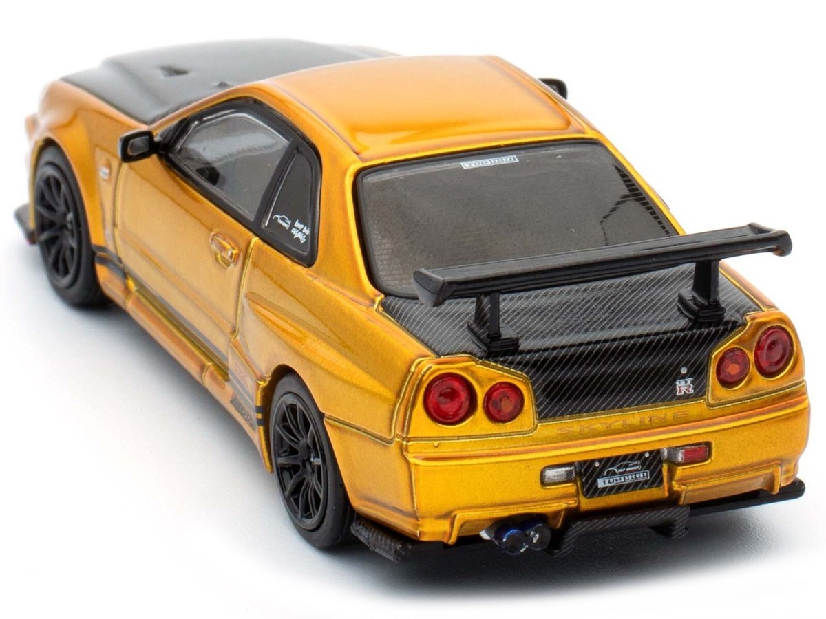 NISSAN SKYLINE GT-R R34 TOP SECRET RHD GOLD 1/64 BY INNO MODELS