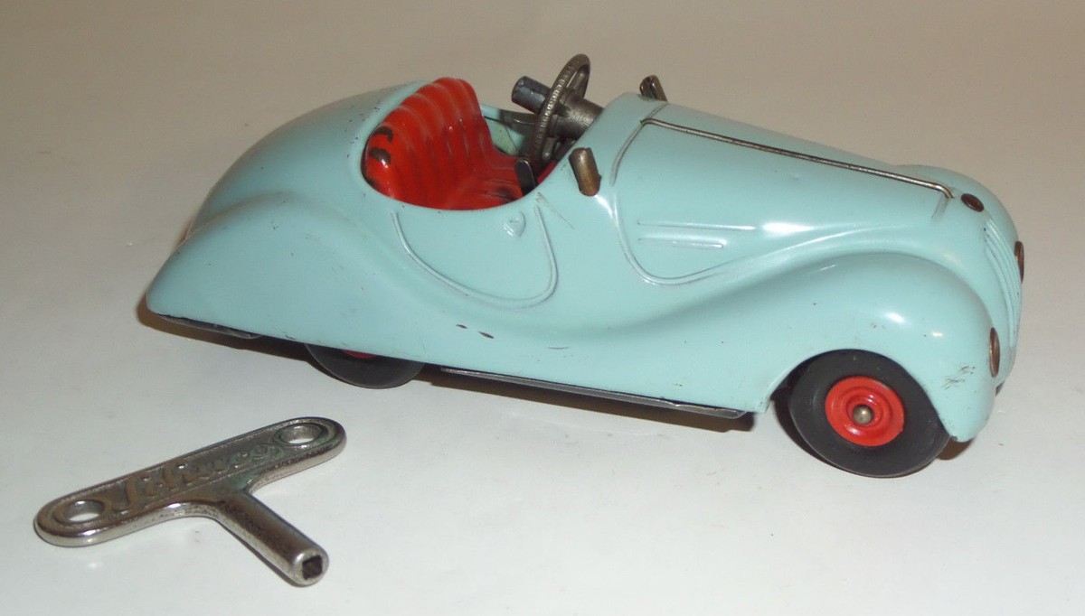 ORIGINAL VINTAGE 1940's SCHUCO AKUSTICO 2002 TIN WIND-UP KEY SKY