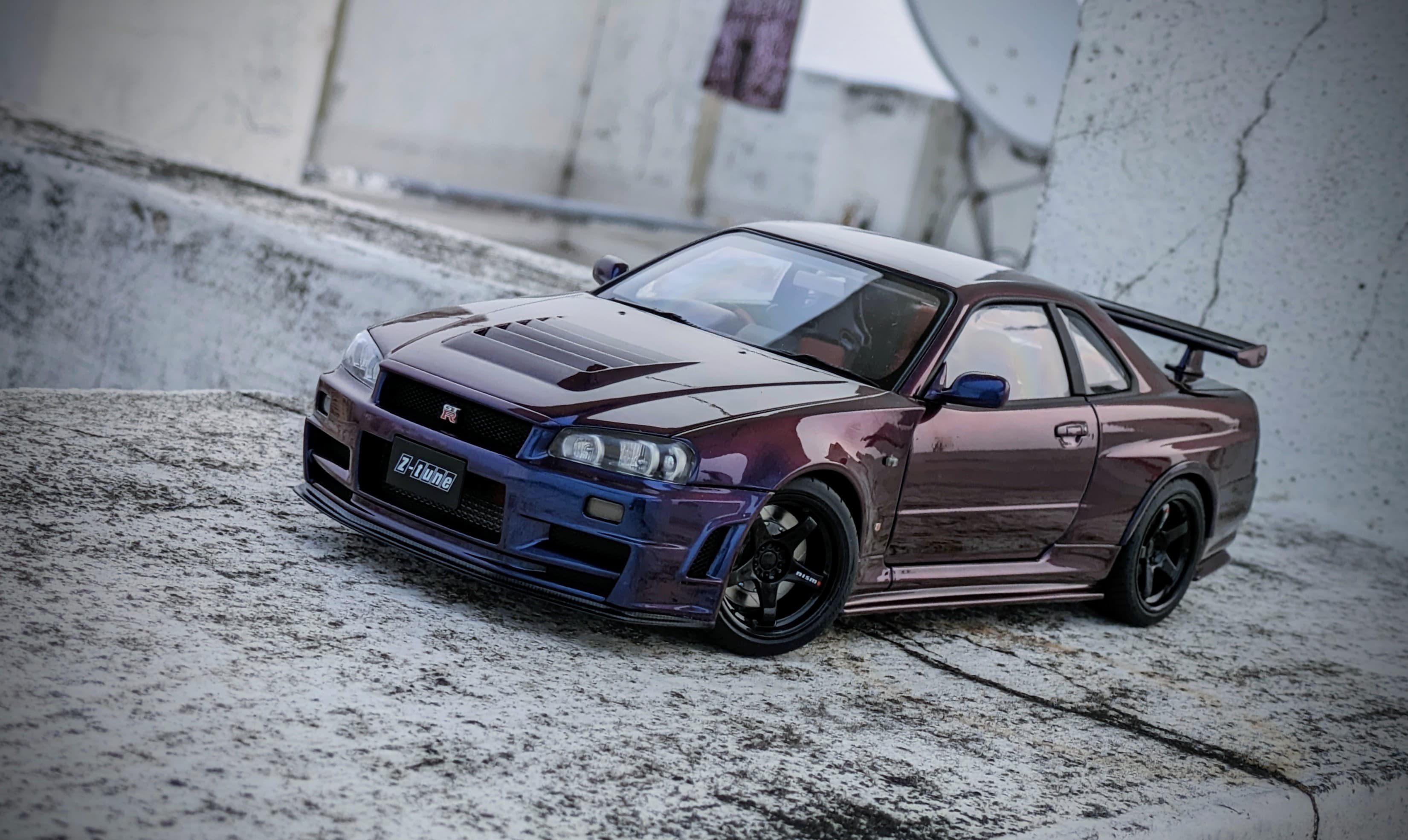 Autoart 1:18 スケールモデルのミッドナイトパープル Nismo R34 Z-Tune