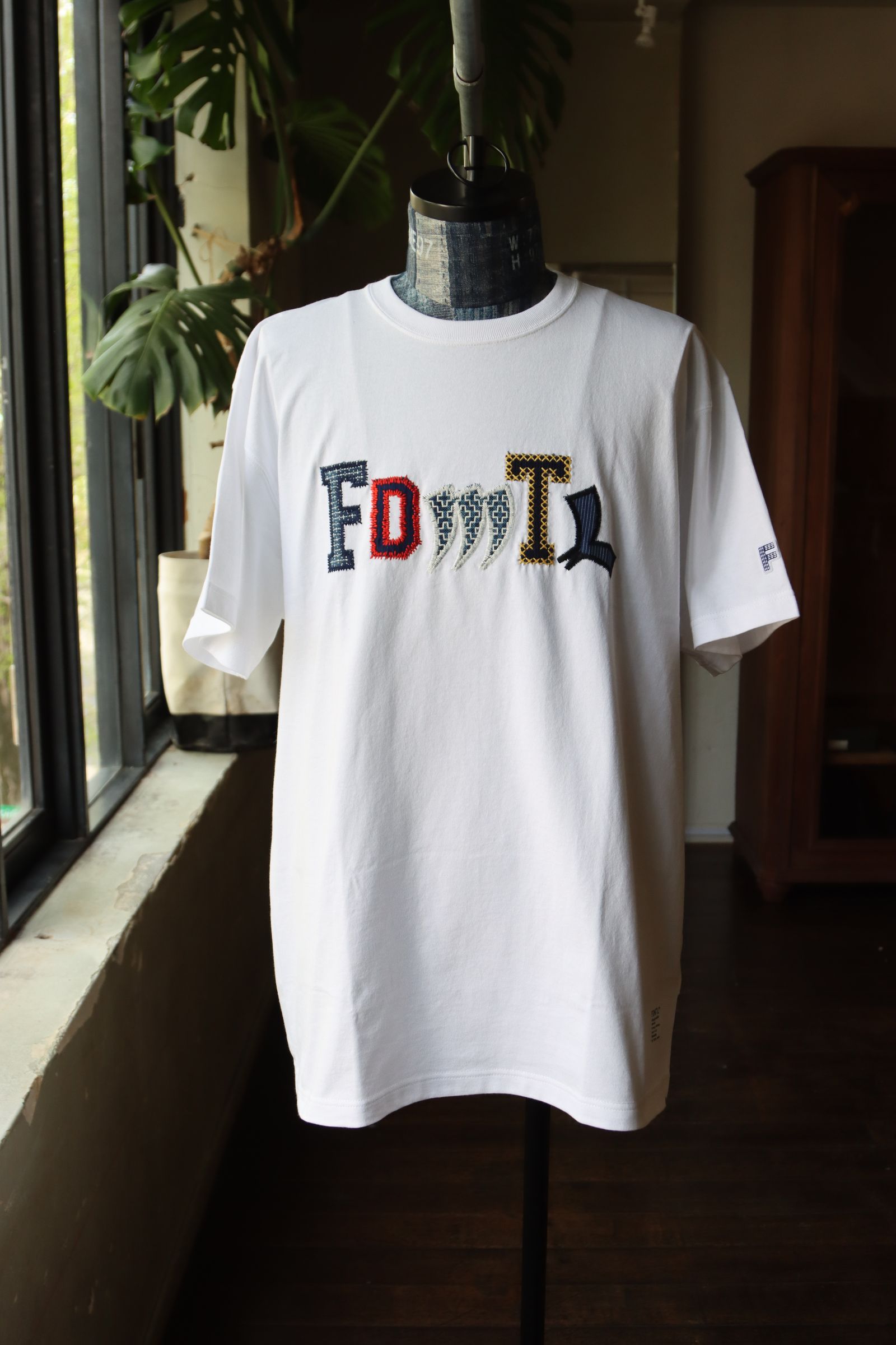 FDMTL - ファンダメンタル パッチワークロゴTシャツ PATCHWARK LOGO