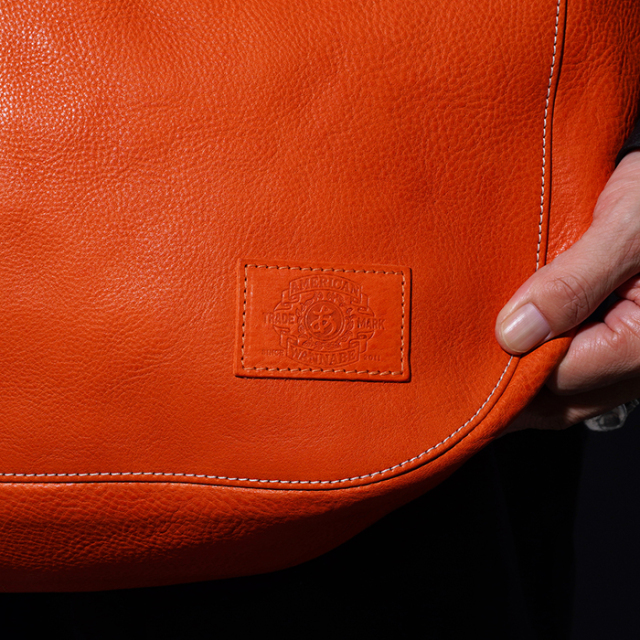 AWA-250602 /「LEATHER NEWS PAPER BAG / ORANGE」レザーニュース