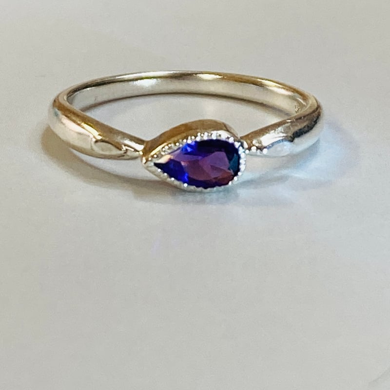 古希祝い 2月誕生石】アメジスト ペアシェイプ 一粒デザインリング/雨