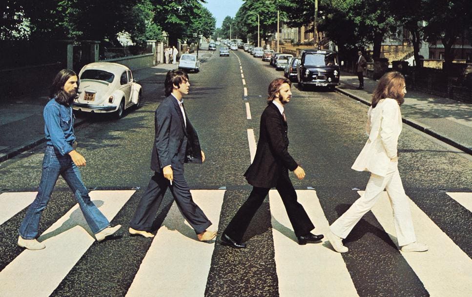 Sidewalk-Parked VW Beetle Photobombed Fab Four's Abbey Road Shot