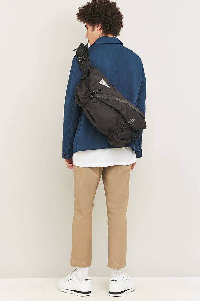 and wander 20L Black Messenger Bag | Urban Outfitters UK